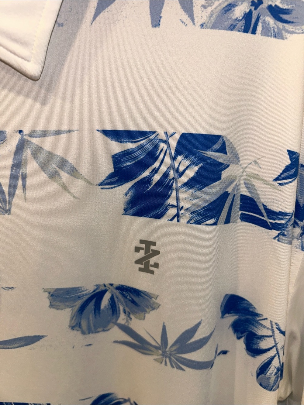 Izod White Polo with Blue Floral Stripe Print
Size => XXL - Picture 8 of 12